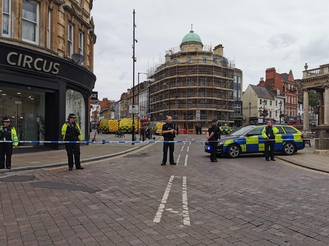 The scene in Northampton town centre today (Tuesday) as police and bomb squad units deal with "suspicious object" found in doorway near Market Square