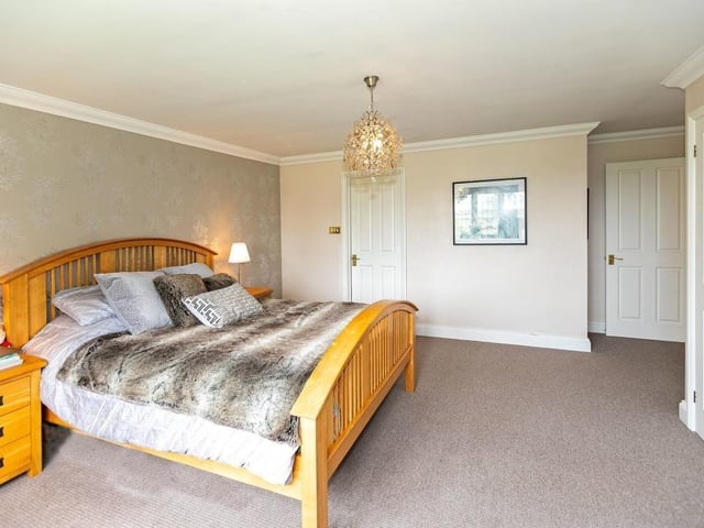 Another of the property's five large double bedrooms