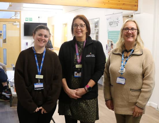 The Corby team and Michelle Hirst.
