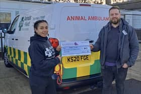 The cheque from Gladwells Pet & Country Store in Rushden being presented to Animals In Need
