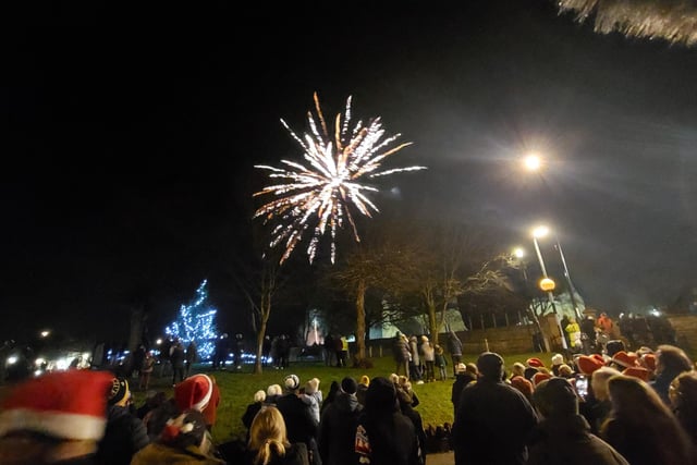 Earls Barton celebrates Christmas Eve in the Square - Fireworks by All Saints Church were a beautiful way to cap off the evening