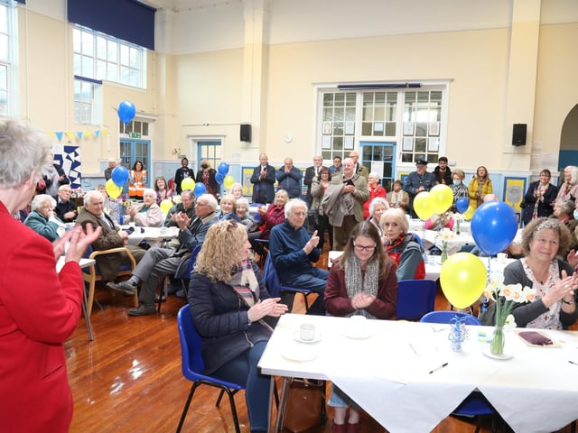 Guests gathered in the school assembly hall