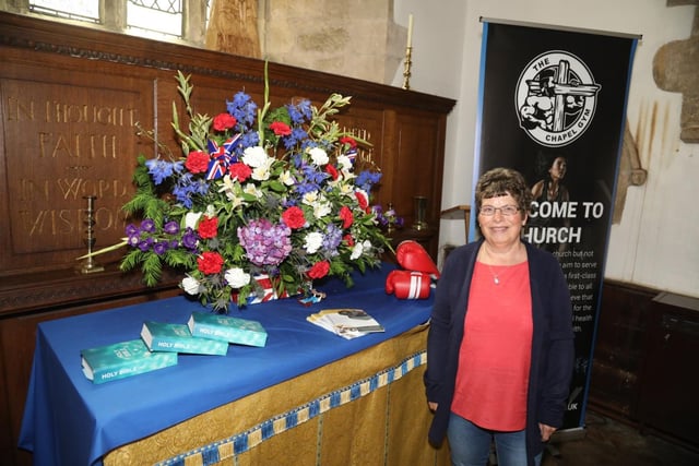 This flower display in St John's Church celebrates the gym that has opened in the Church of the Epiphany in Corby town centre
