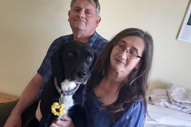 Mick, Sam and Sophie in their guest bedroom at their home in Earls Barton.