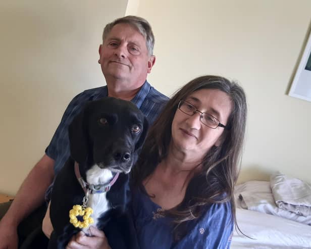 Mick, Sam and Sophie in their guest bedroom at their home in Earls Barton.