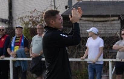 Elliot Sandy applauds the travelling supporters after Diamonds' FA Cup win at Desborough Town (Picture: Shaun Frankham)