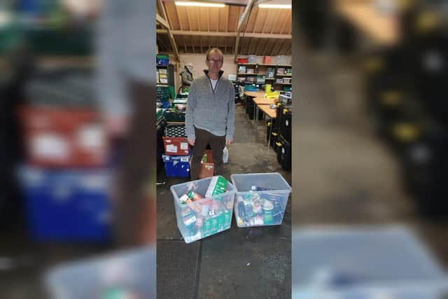 Encompass food bank receives a collection from AFC Rushden and Diamonds