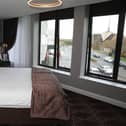 Some of the rooms at the Saxon Crown have views across Elizabeth Street, Corby