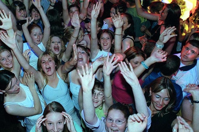 These party goers were having a great time at the Wesley in 2000. Remember this?