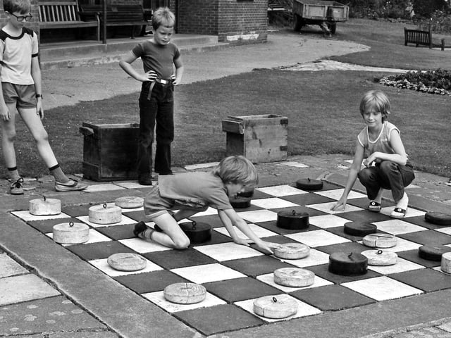 Playing draughts at Rockingham Road Pleasure Park in Kettering in 1981