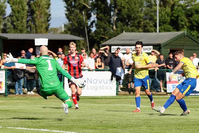 Lloyd Buckby scores for Wellingborough Town against Kettering Town (Picture: Rob Webb)