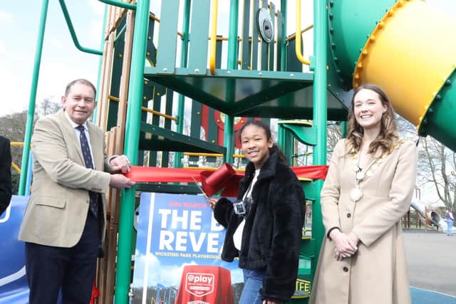 Kettering, Wicksteed Park  - official opening of Jack and the Beanstalk climbing frame. l-r MP for Kettering Philip Hollobone, Mia Opoku Agyeman, Mayor of Kettering Cllr Emily Fedorowycz /National World