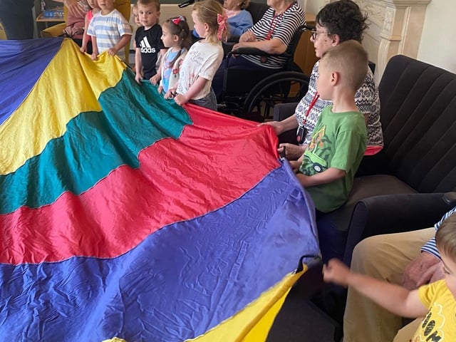 Residents and children were excited with the Parachute play
