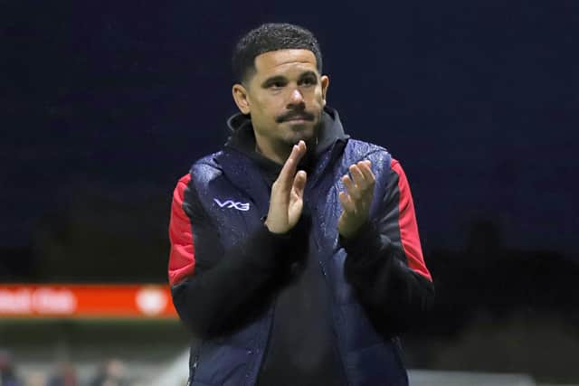 Liam McDonald applauds the Kettering supporters following Saturday's 0-0 draw with St Ives Town (Picture: Peter Short)