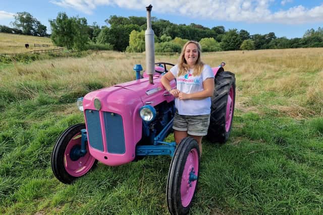 Anna Griffiths with her pink Fordson Dexta tractor