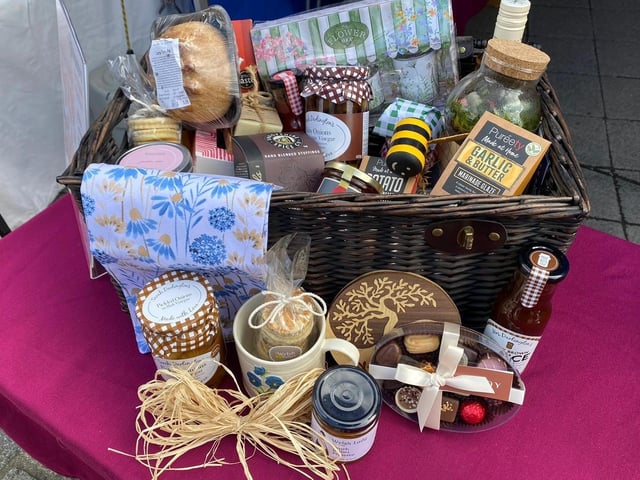 People attend Rushden's St George's Day market on Saturday