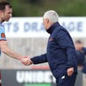 Kettering Town boss Ian Culverhouse shakes hands with Gateshead player-manager Mike Williamson following the 1-1 draw at Latimer Park on Saturday. Pictures by Peter Short