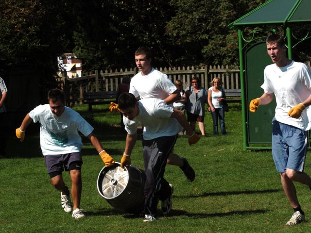 Geddington, Barrel Trundle, The Star team drag the barrel across the playing fields 2006