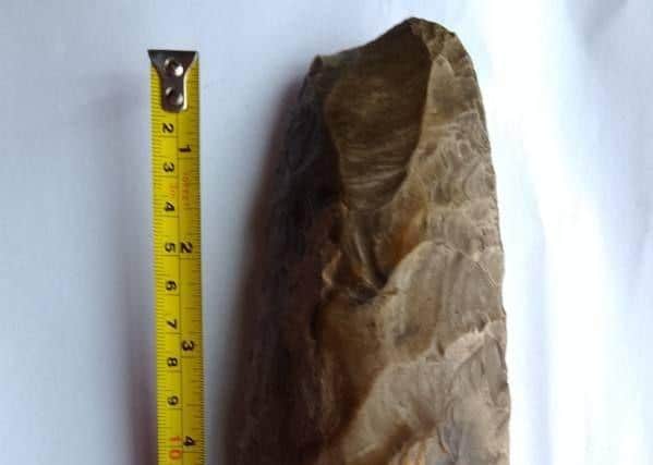 The precious axe, IS IT A FASCINATING FIND OR A FABULOUS FAKE, THE MYSTERY MOUNTS