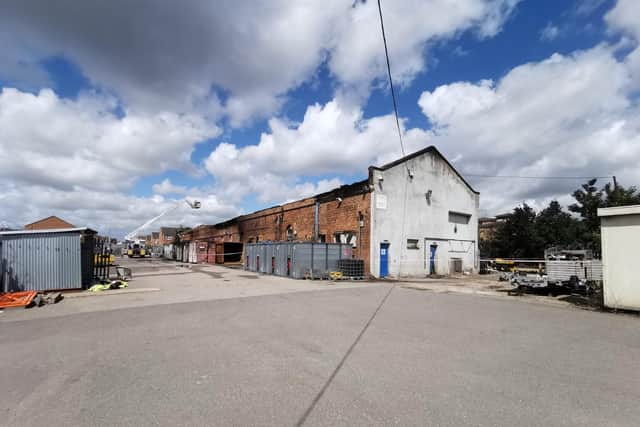 The aftermath of the National Rail Depot fire in Cotton End on June 28.