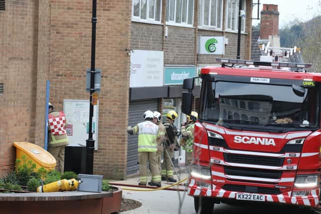 Firefighters work in the area between the former Gala Bingo hall in High Street, Kettering accessed via Meadow Road