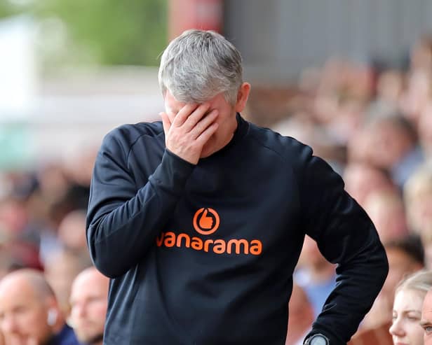 Lee Glover's reaction tells the story as his Kettering Town team were relegated on the final day of the Vanarama National League North season. Pictures by Peter Short