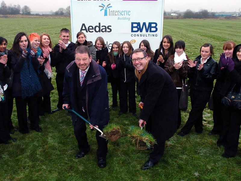 Headteatcher David Tristram, and MP Phil Hope cutting the first sod for the new Kingswood Academy