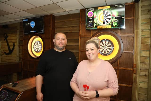 Jack Trend owner Bowling Vision and Jenny Black - manager Thunderbowl, Kettering with the interactive darts boards