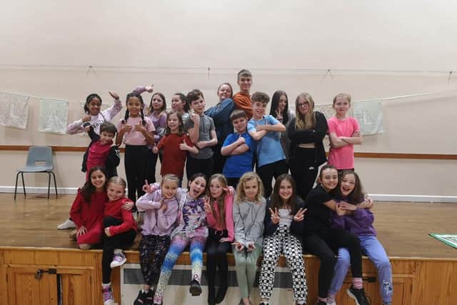 The cast of GLJ THEATREs MATILDA JR taking to the stage at Glamis Hall. 