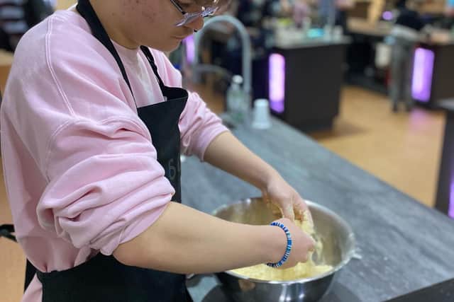One of the young bakers making the pasty