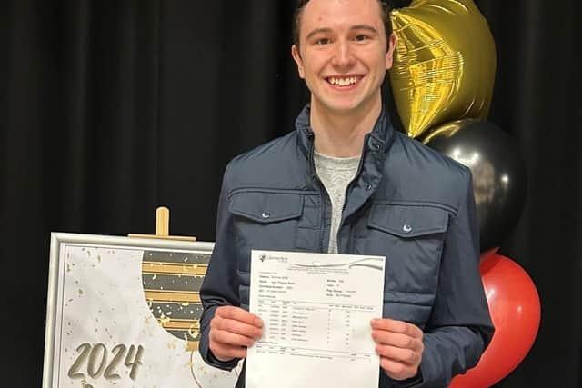 Jack Baish celebrating his GCSE results at Latimer Arts College