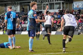 Danny Gordon heads off to celebrate after scoring in Corby Town's 4-0 win over St Neots Town at Steel Park on Saturday. Pictures by Jim Darrah