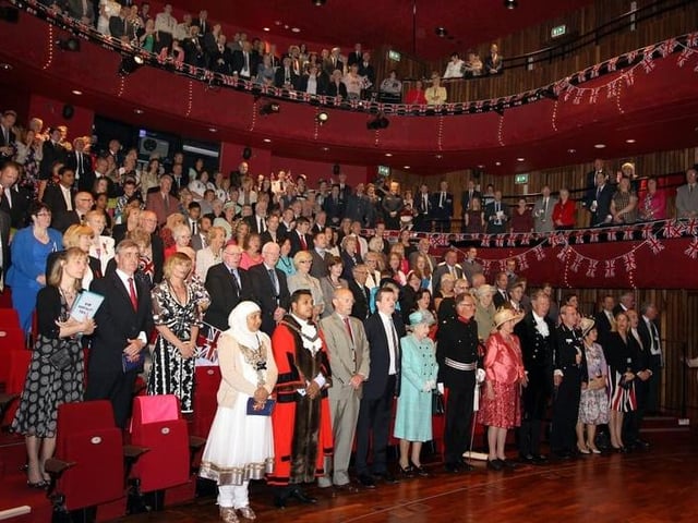 The Queen surrounded by VIPs in The Core at The Corby Cube