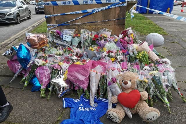 Floral tributes have been left at the scene of the incident.