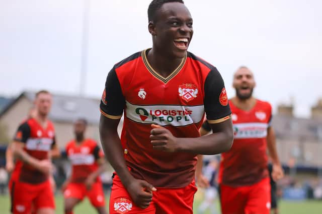 Andrew Oluwabori shows his delight after scoring the Poppies' equaliser at Buxton