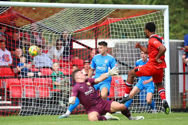 Tyrone Lewthwaite scores the Poppies' second goal against Stourbridge