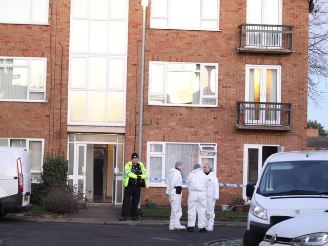 Officers at the murder scene