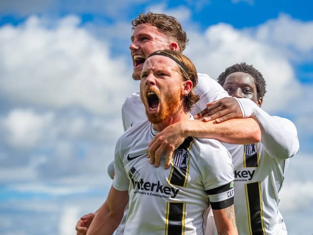 Jordon Crawford celebrates after scoring Corby Town's equaliser to make it 3-3 versus AFC Rushden & Diamonds (Picture: Jim Darrah)