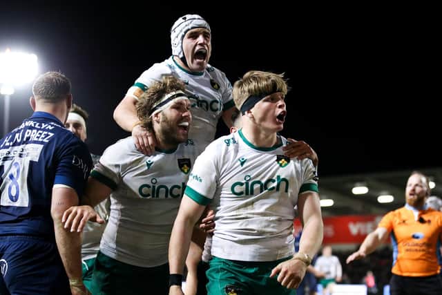 Henry Pollock was mobbed by his team-mates after scoring a stunning try (photo by Jess Hornby/Getty Images)