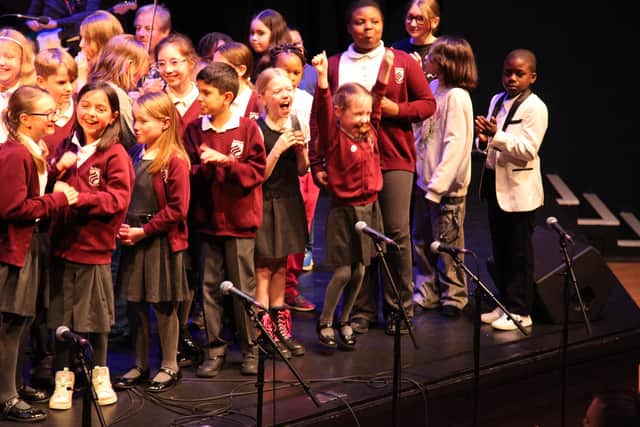 Performers on stage from Wellingborough Redwell Junior School/Nene Education Trust