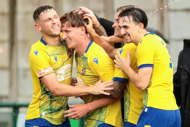 Danny Draper of Wellingborough Town celebrates scoring his side's second goal against Belper Town (Picture: Rob Webb)