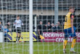 Ben Isaacson celebrates scoring what proved to be the matchwinning goal in Corby Town's 3-2 New Year's Day success over AFC Rushden & Diamonds (Picture: Jim Darrah)