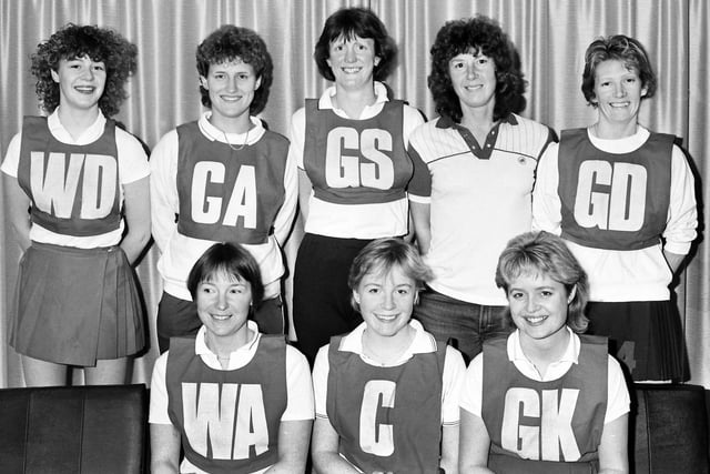 1986 - a netball team lines up for a photo but which team are they?
