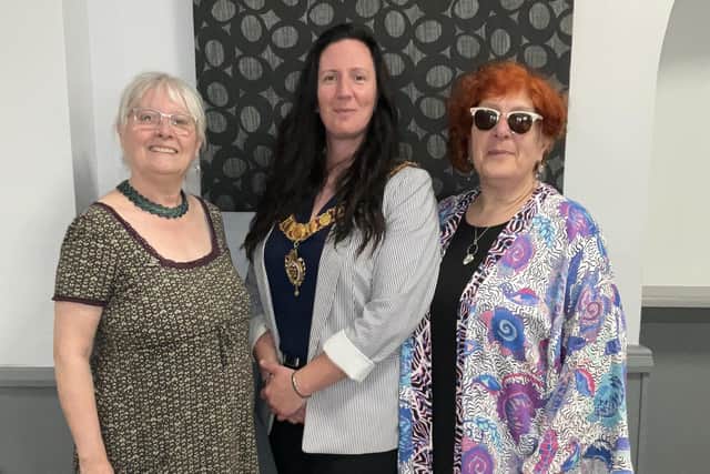 The Eloquent Fold's Phiona Richards (left) and Carole Miles (right) had tea with Corby mayor Leanne Buckingham (centre) to celebrate the positive impact of their work on the local community. Image: Eloquent Fold