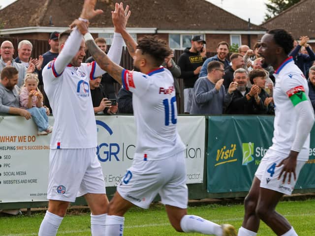 AFC Rushden & Diamonds' players and supporters celebrate Matty Warburton's opening goal in their 3-1 win over Peterborough Sports (Picture: Shaun Frankham)