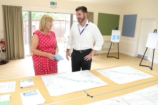 Lynn Hogg discusses the project with Ben Plucknett from WSP