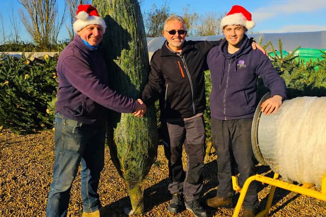 Robert Head of Maintenance at Elm Bank care home, accepts the kind festive donation