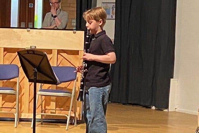 Junior Winner Tom Brown playing the Clarinet