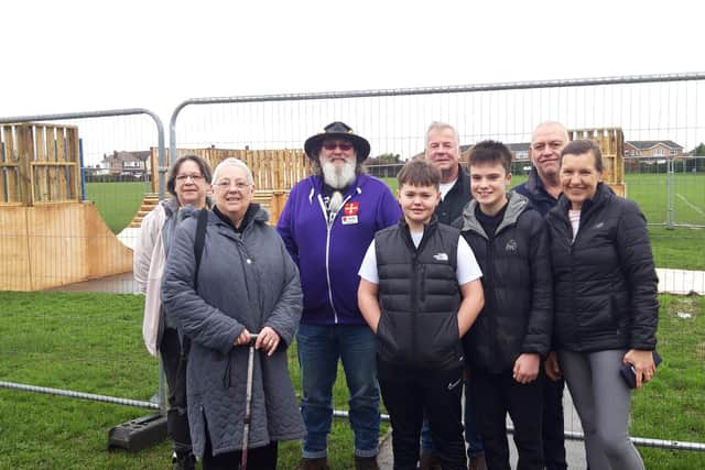 Jamie and Alfie with, pictured from left to right, Cllr Sue Watts, Cllr Jenny Davies, Cllr Adrian Watts (deputy mayor) Cllr Murray Scott, and North Northants ward councillors John Currall and Jan O’Hara.