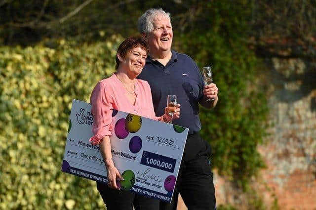 Marion Wood and Michael Williams celebrate winning £1 million on the Lotto